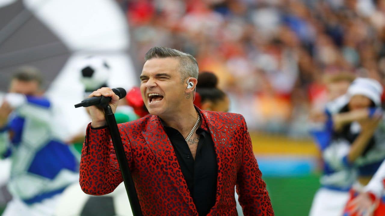 Robbie Williams goes all-out showing his love for the sport. (Image: Reuters)