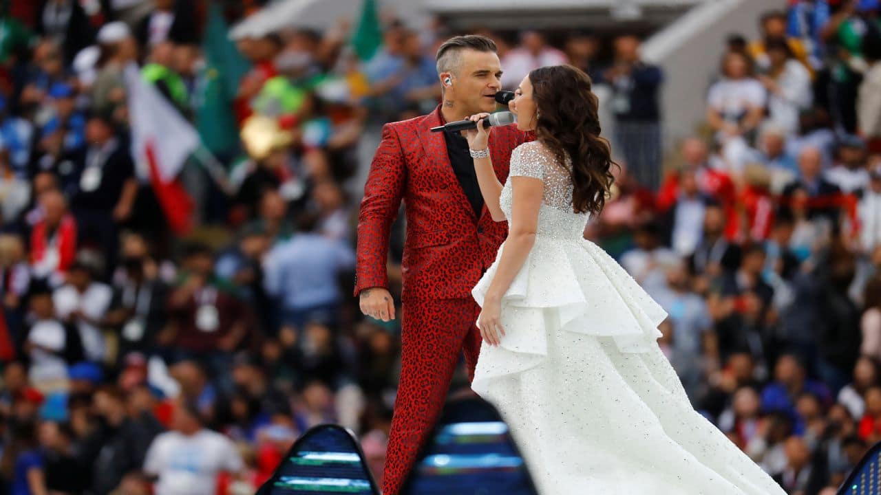 Robbie Williams alongside Aida Garifullina performing at the opening ceremony. (Image: Reuters)