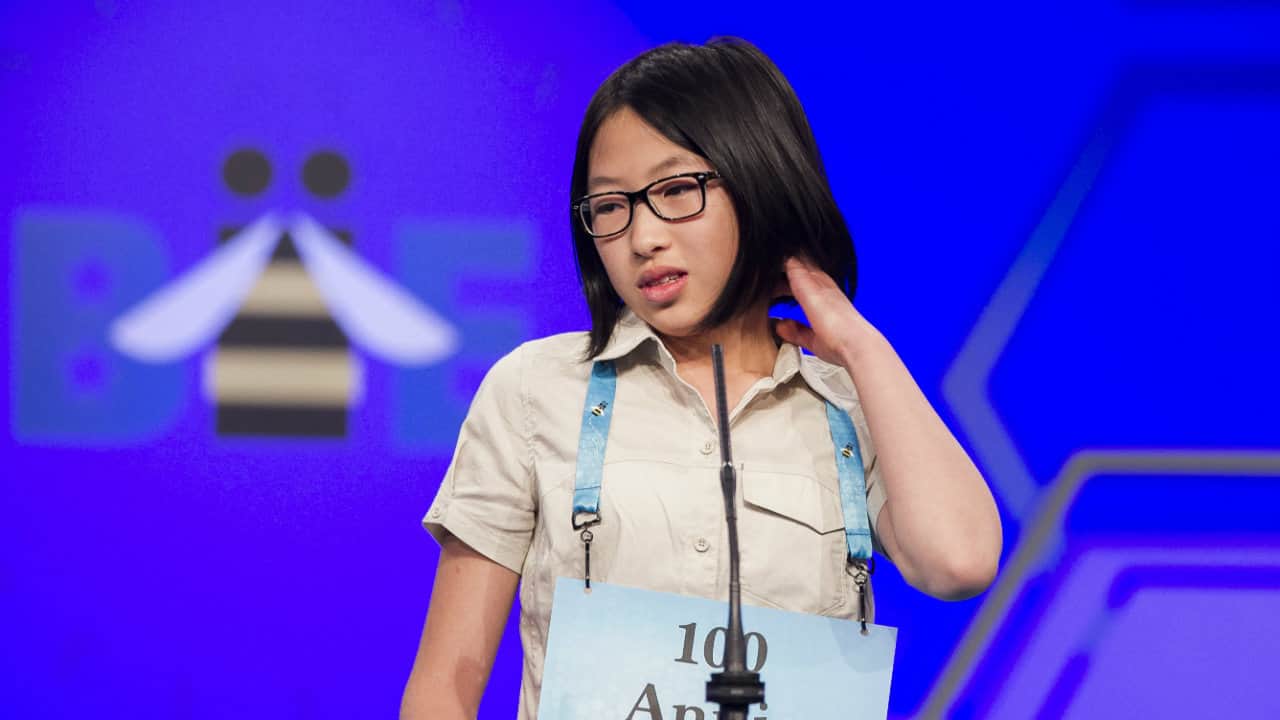 Annie Huang, 12, from &quot;Surrey, British Columbia&quot;, Canada, spells her word during the 2nd Round. (Photo: AP)