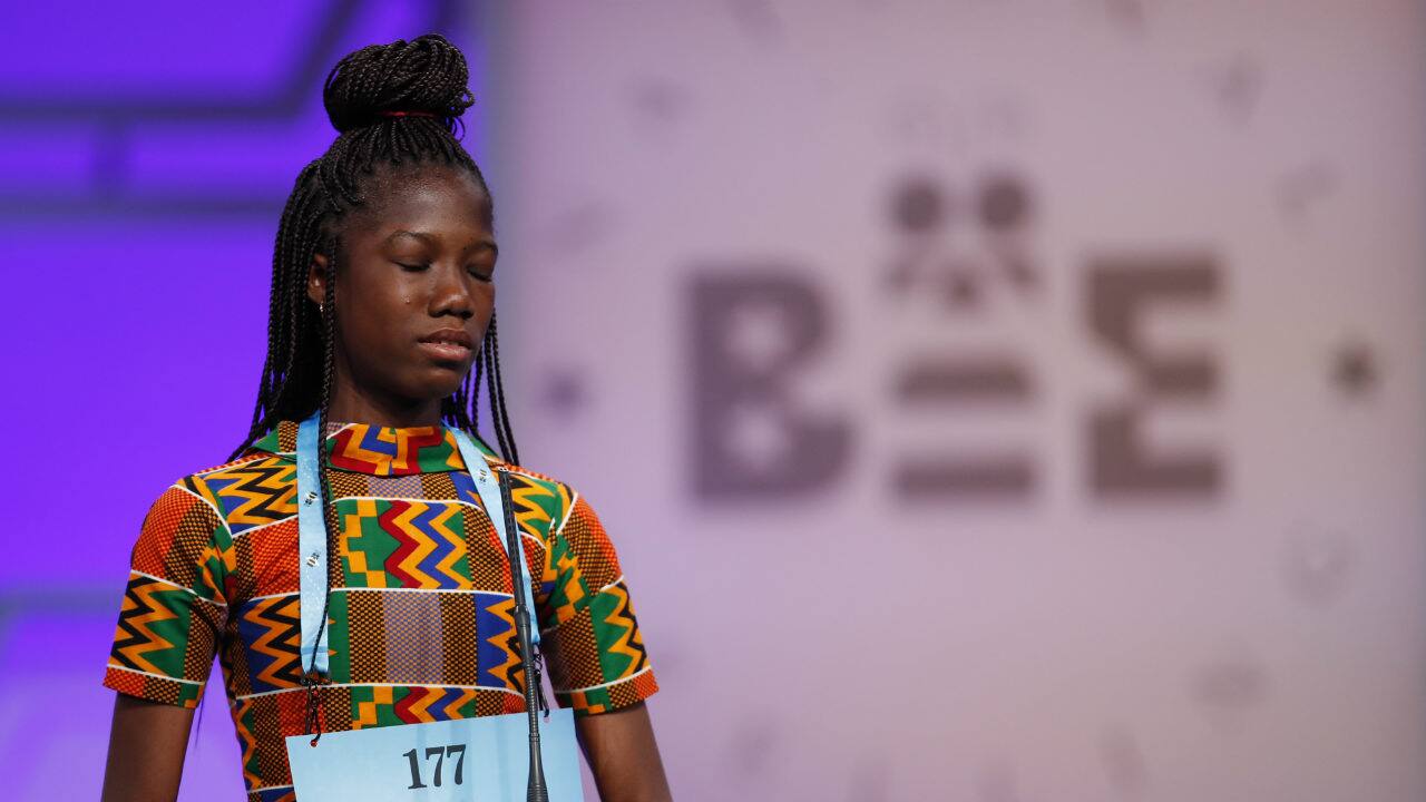 Shifa Amankwa-Gabbey, 12, from Ghana, reacts after spelling her word incorrectly during the 3rd Round. (Photo: AP) 