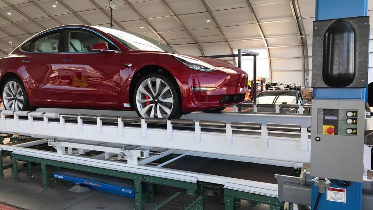 Elon Musk unveils Tesla Model 3 Performance car's new production line