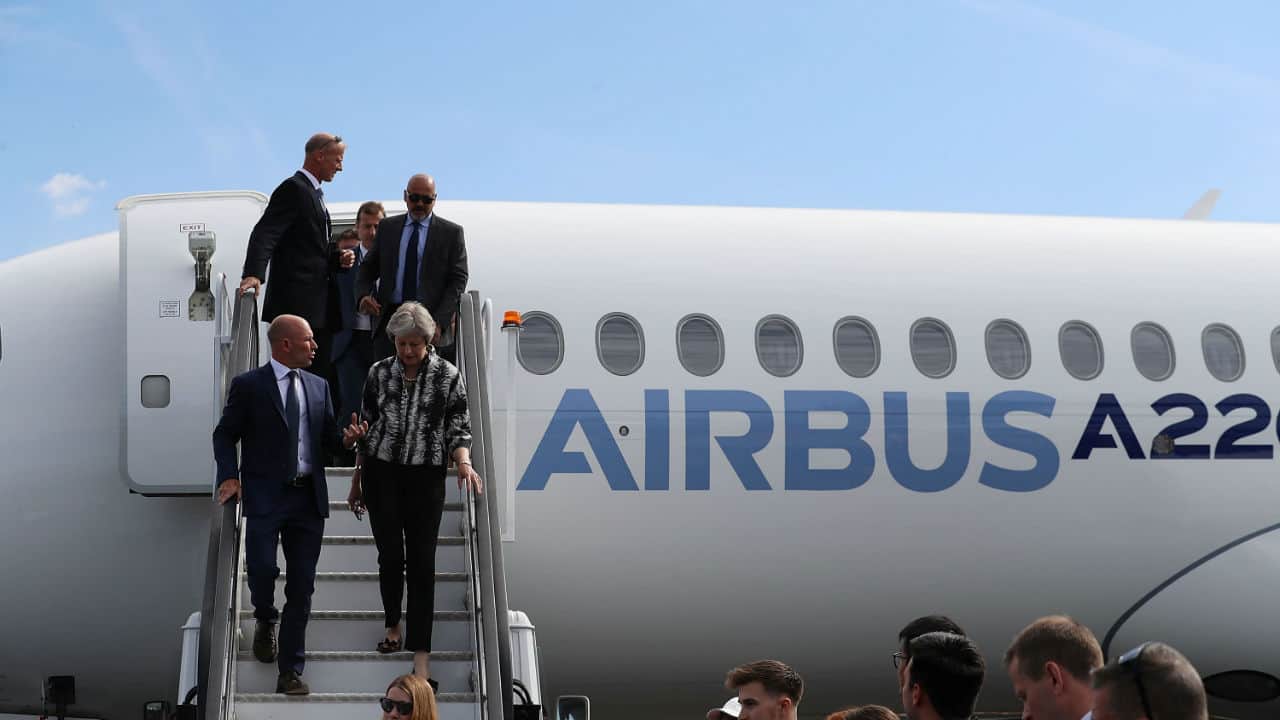 UK PM Theresa May disembark an Airbus A220 aircraft at the 2018 Farnborough Airshow. (Image: Reuters)