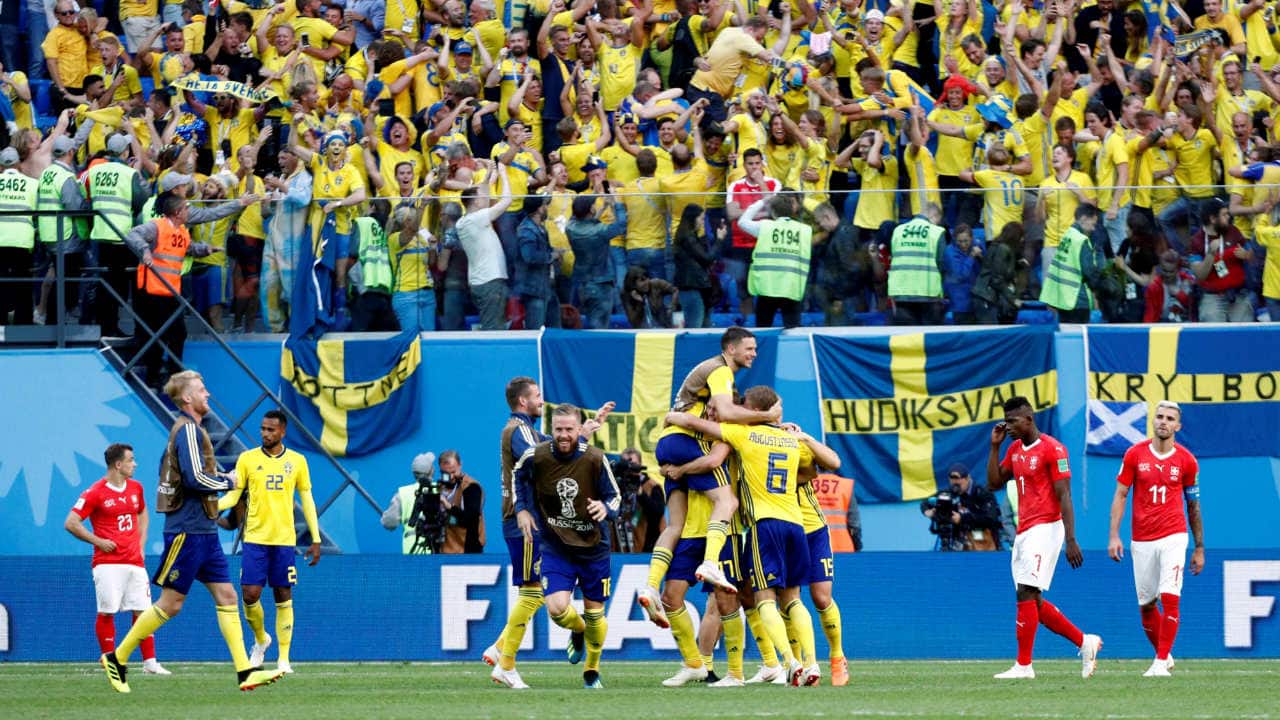 Swedish players and fans celebrate their qualification into the quarter finals. (Image: Reuters)