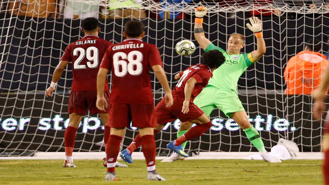 Liverpool's Mo Salah scores a goal past Manchester City's Joe Hart in the International Champions Cup. (Image: REUTERS)
