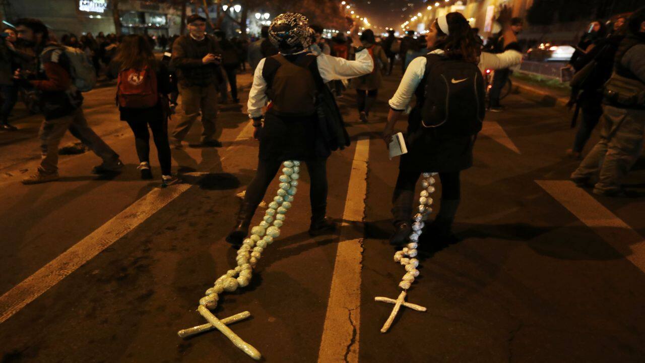 Demonstrators take part in a march for free abortion rights and to demand an end to sexism and gender violence in the education system, in Santiago, Chile. (Image: REUTERS)