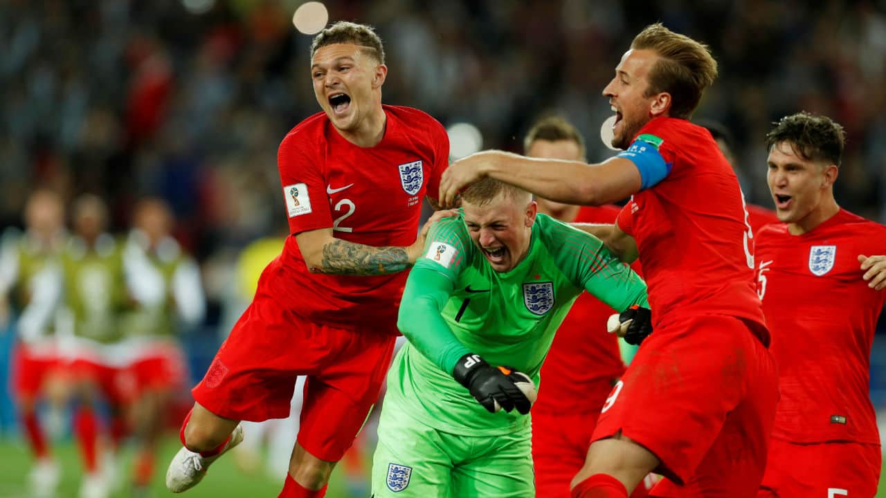 England's Jordan Pickford celebrates with team mates after they beat Colombia 4-3 via penalties to secure a place in the quarter-finals of the tournament. (Image – Reuters) England's Jordan Pickford celebrates with team mates after they beat Colombia 4-3 via penalties to secure a place in the quarter-finals of the tournament. (Image – Reuters)