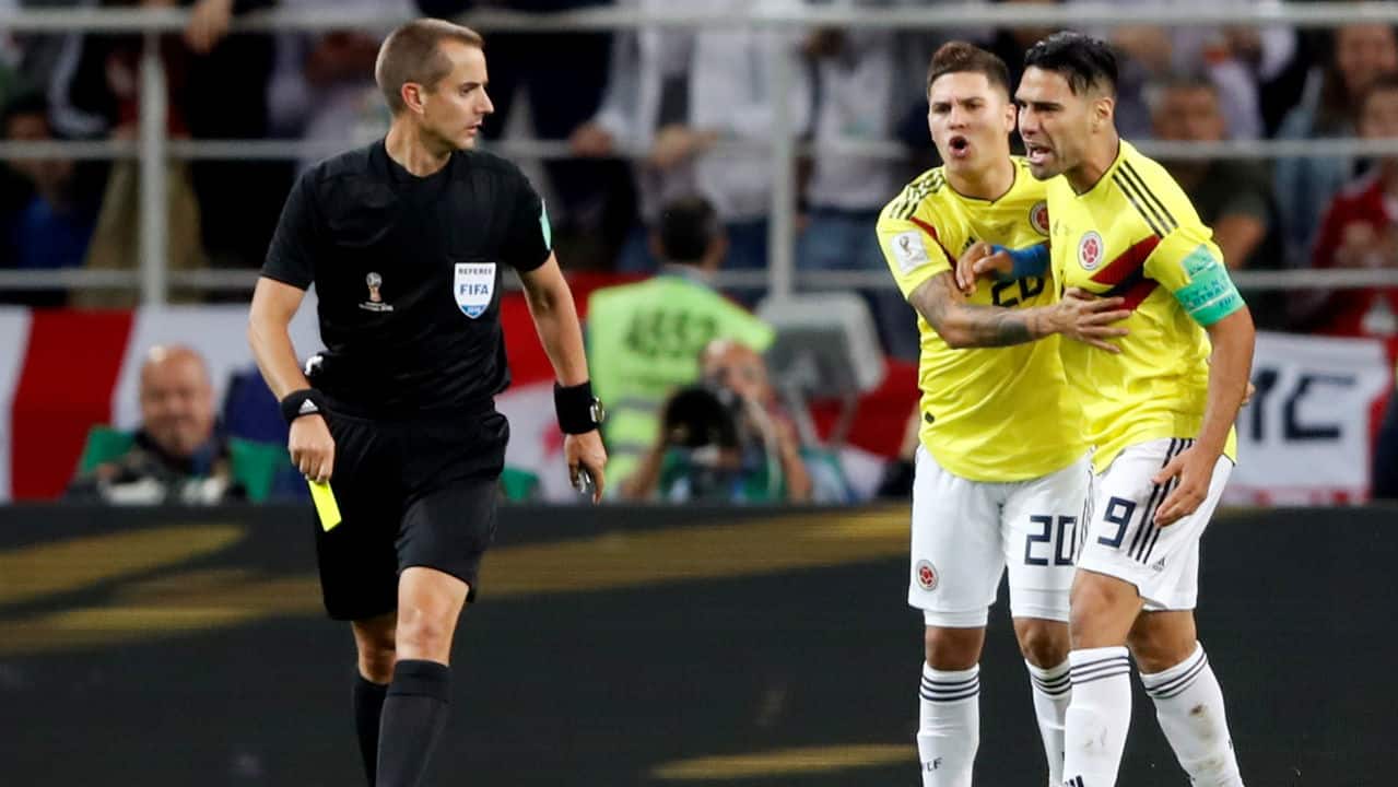 Colombia's Radamel Falcao reacts after being shown a yellow card by referee Mark Geiger. There were eight yellow cards shown during the match, no other game at the 2018 World Cup has seen more. Colombia received six yellow cards, the most by any side in a single game at the 2018 tournament. (Image – Reuters) Colombia's Radamel Falcao reacts after being shown a yellow card by referee Mark Geiger. There were eight yellow cards shown during the match, no other game at the 2018 World Cup has seen more. Colombia received six yellow cards, the most by any side in a single game at the 2018 tournament. (Image – Reuters)