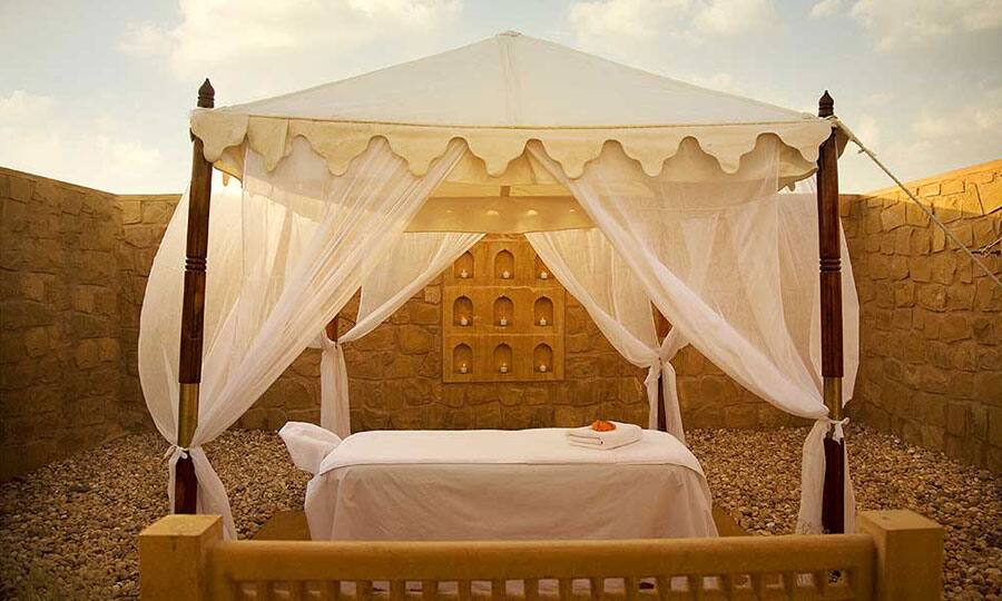 Serai, Jaisalmer Glamping in Sujan: The Serai will leave you awestruck. There are 21 tents here, out of which 14 are suites that cover an area of over one thousand sq ft. Six luxury tented suites have their own private walled–in garden, a sunken, heated dip pool with Jacuzzi jets. The exclusive royal tented suite has its own spa, outdoor pool, dining and lounge tents, all walled into a private enclosure. The jaunt is planned keeping your taste and mood in mind.