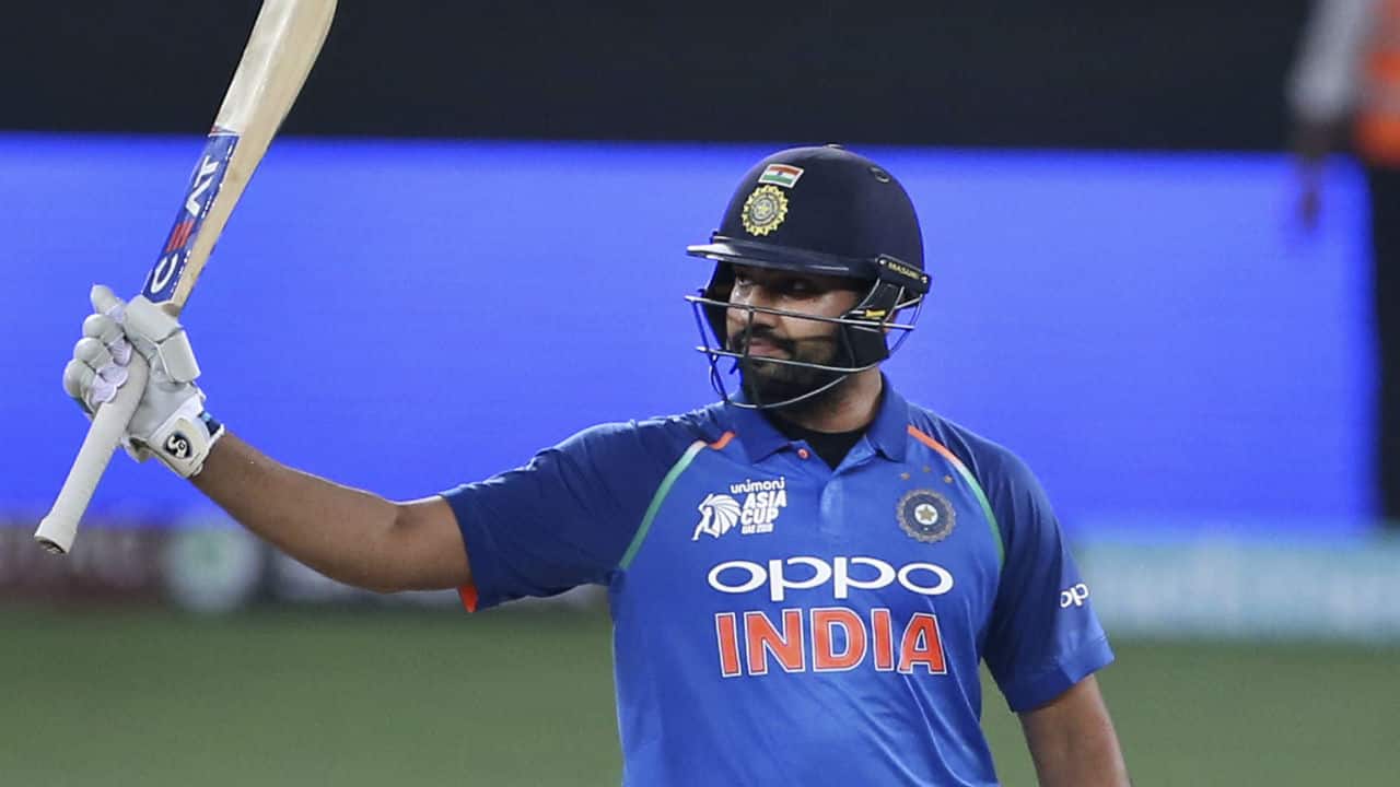 Rohit Sharma continued from where he left off against Pakistan and completed his second consecutive half-century of the series. The right hand batsman reached the milestone by lifting Shakib Al Hasan towards cow-corner for a massive six in the 23rd over. (Image: AP)
