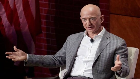 Jeff Bezos becomes the world's first person to hit a net worth of $200 billion