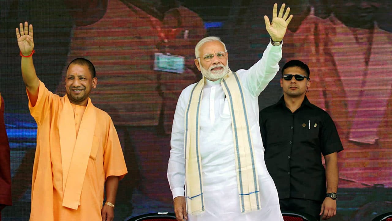 Prime Minister Narendra Modi and Uttar Pradesh Chief Minister Yogi Adityanath during a public meeting, in Varanasi, Uttar Pradesh (File image: PTI)