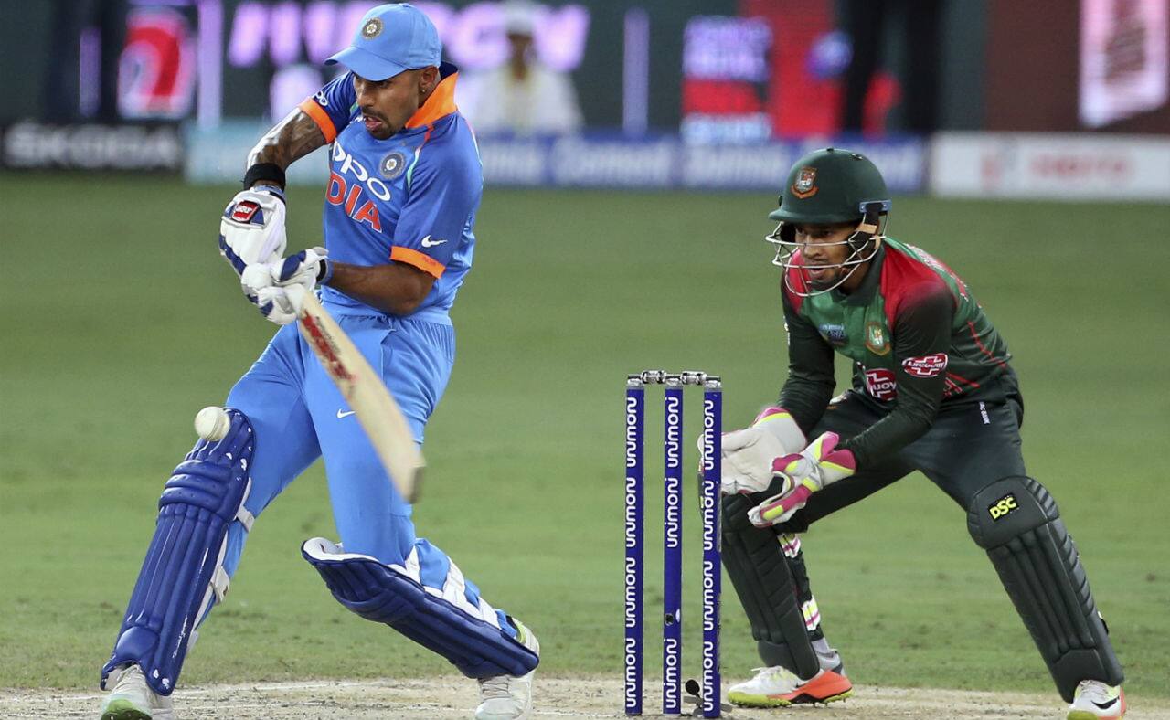 Skipper Rohit Sharma and Shikhar Dhawan got India off to a flying start once again as they added 61 runs for the first wicket. Dhawan was the first to depart when he was trapped LBW by Shakib Al Hasan in the 15th over. (Image: AP)