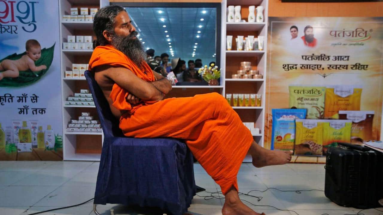 Yoga guru Baba Ramdev and Patanjali Ayurved make for a winning brand:  Here's why – Firstpost