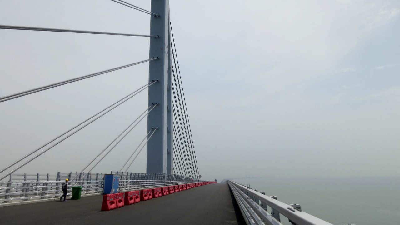 A one-way bus ride to Macau from Hong Kong will cost $15.30 per person, and cars would have to pay a toll of $22 for each trip. (Image: Reuters)