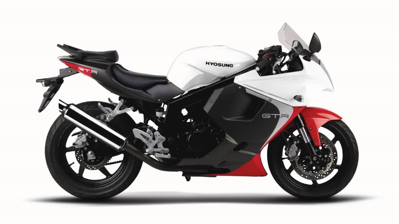 Hyosung GT250 R | Rs 3.38 lakh (ex-showroom) | The Hyosung GT250 R is a sub-300cc sport bike with a 249cc oil-cooled V-twin producing 28 Bhp at 10,000 rpm and 22 Nm of torque at 7,000 rpm. Transmission comes from a 5-speed gearbox. Suspension is handled by an upside down fork up front and a rear monoshock with preload adjustment. (Image source: Motoroyale) Hyosung GT250 R | Rs 3.38 lakh (ex-showroom) | The Hyosung GT250 R is a sub-300cc sport bike with a 249cc oil-cooled V-twin producing 28 Bhp at 10,000 rpm and 22 Nm of torque at 7,000 rpm. Transmission comes from a 5-speed gearbox. Suspension is handled by an upside down fork up front and a rear monoshock with preload adjustment. (Image source: Motoroyale)