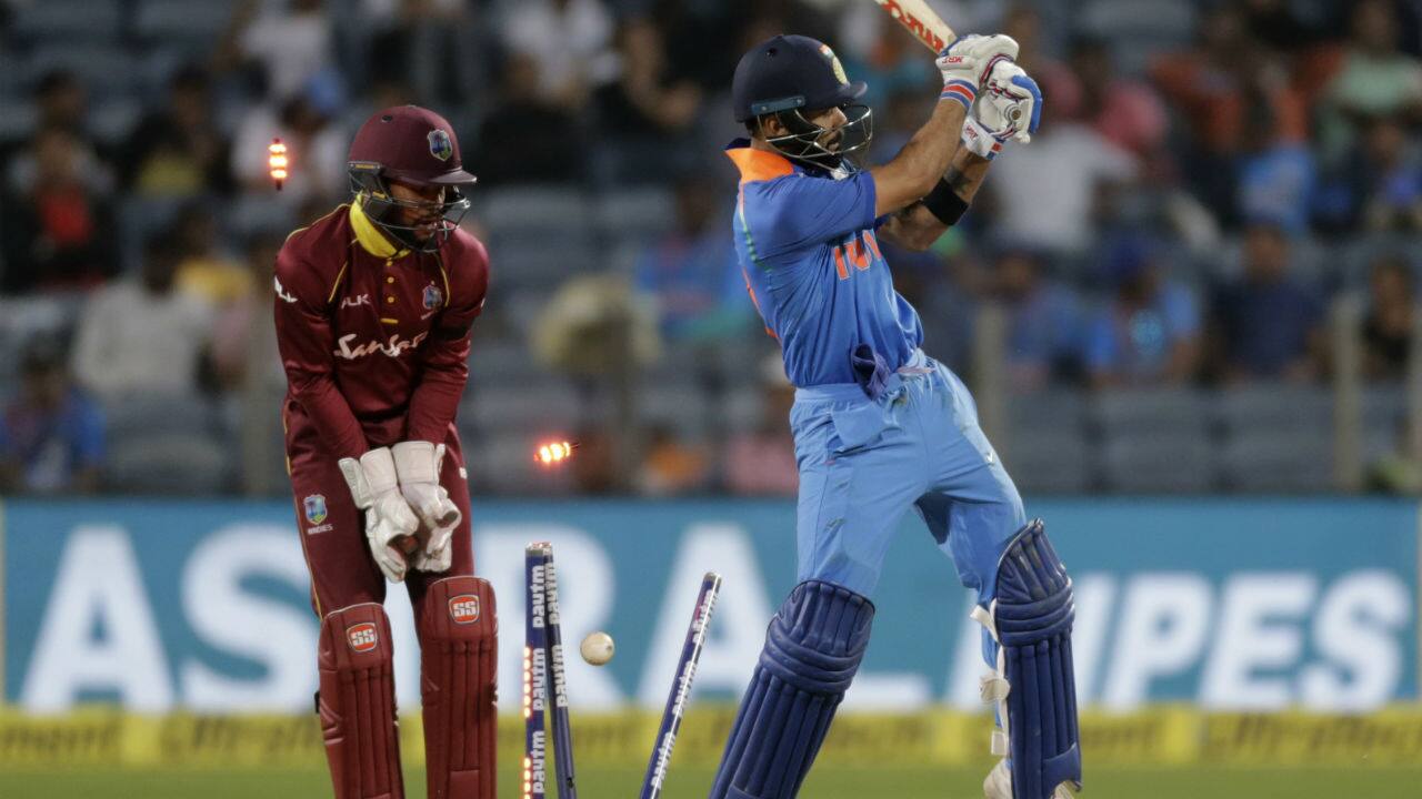 Marlon Samuels castled Kohli soon after he completed his century to extinguish all hopes of an Indian comeback. Kohli was dismissed on a personal score of 107 with India still needing 64 runs to win. After the loss of their skipper, the Indian innings folded tamely with a score of 240-all out. The Windies victory tied the series 1-1 with two matches still to be played. (Image: AP) Marlon Samuels castled Kohli soon after he completed his century to extinguish all hopes of an Indian comeback. Kohli was dismissed on a personal score of 107 with India still needing 64 runs to win. After the loss of their skipper, the Indian innings folded tamely with a score of 240-all out. The Windies victory tied the series 1-1 with two matches still to be played. (Image: AP)
