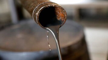 Oil industry turns to mergers and acquisitions to survive