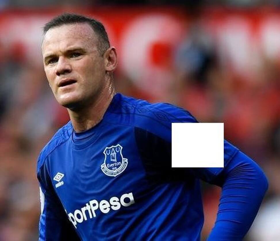 What is masked in this image? What is masked in this image?
