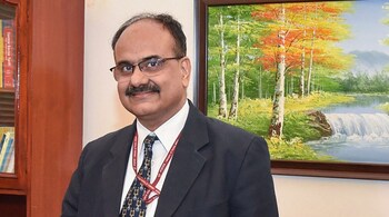 New Delhi: Incoming Revenue Secretary Ajay Bhushan Pandey (R) shakes hands with outgoing Finance &amp; Revenue Secretary, Hasmukh Adhia during the taking charge ceremony,  in New Delhi, Friday, Nov 30, 2018. (PTI Photo/Manvender Vashist ) (PTI11_30_2018_000173B)