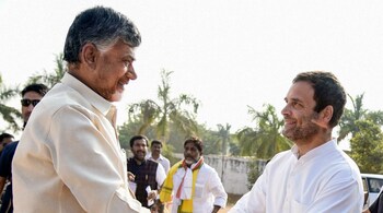 Congress President Rahul Gandhi being greeted by Andhra Pradesh Chief Minister Chandrababu Naidu during election campaign in Khammam, Telangana- Nov 28, 2018 (Image- PTI)