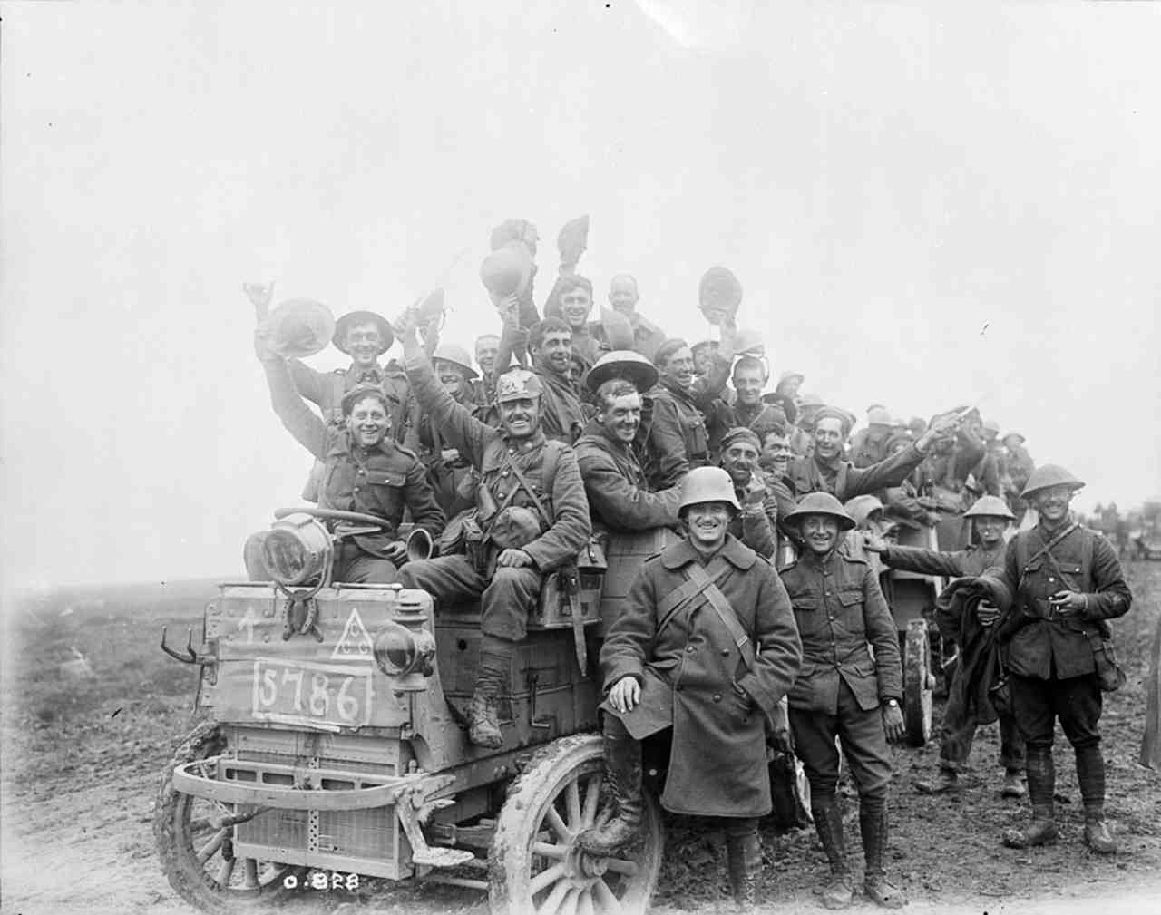 Pictured: Canadian soldiers carrying war trophies, return victorious from Courcelette during the Battle of the Somme in 1916. (Image: Reuters) Pictured: Canadian soldiers carrying war trophies, return victorious from Courcelette during the Battle of the Somme in 1916. (Image: Reuters)