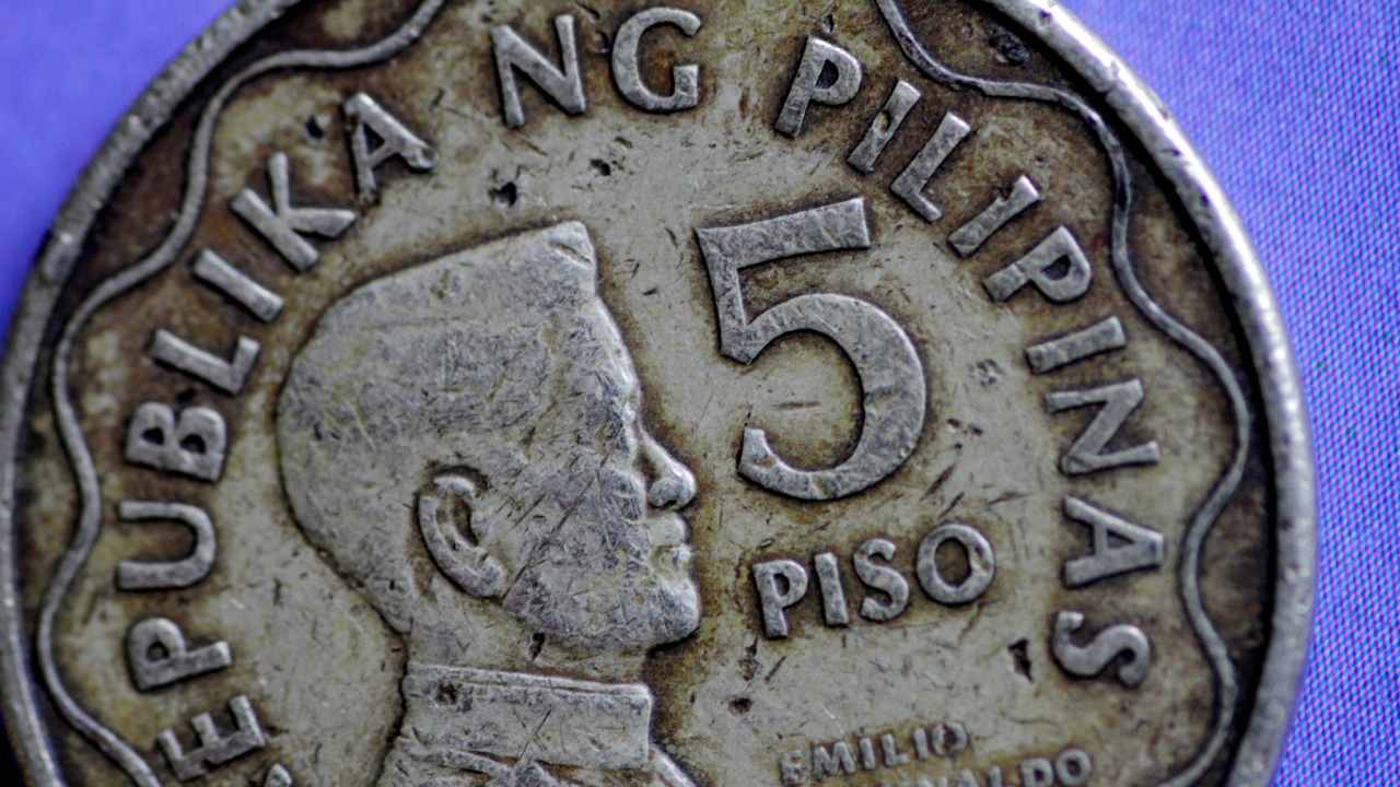 Philippines | Money and round things | The Filipinos believe in wealth and good fortune for the New Year. They spread coins in every nook and corner of the house to make sure the coming year is prosperous. Wearing anything round signifies prosperity, so polka dots are quite the rage around this time. (Image: Reuters)