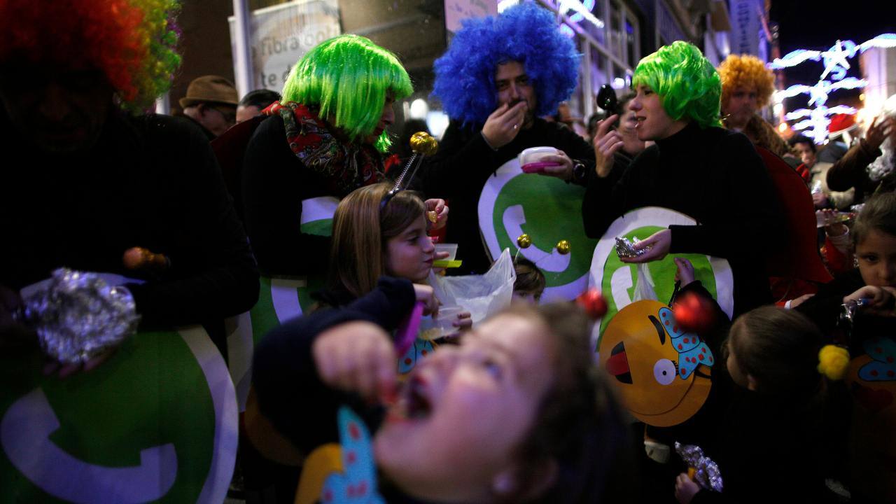 Spain | Eating Grapes | The Spaniards welcome the New Year by stuffing 12 grapes, one for each second as they draw curtains on the concluding year. If you succeed, good luck will follow you in the following 12 months. (Image: Reuters)