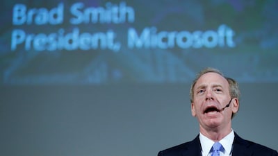 Microsoft's Brad Smith rejects JD Vance's H-1B allegations, cites Satya Nadella and warns Trump's green-card restrictions could drive AI talent abroad.