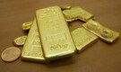 Gold futures slip 0.50% on global cues