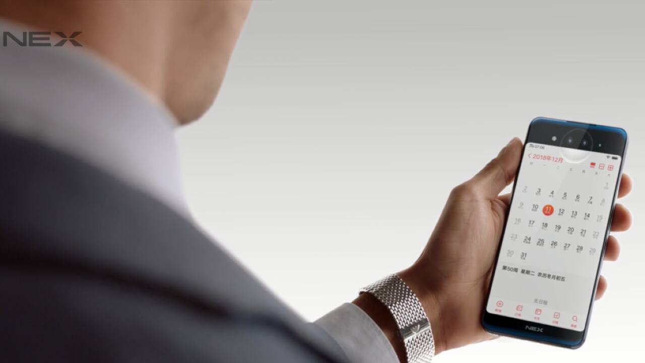 The dual displays on the phone eliminate the need of the front camera setup, offering a bezel-less design, devoid of a notch. The screen on the back of the phone allows you to capture amazing selfies with the phone’s rear triple camera setup. (Image: Vivo) The dual displays on the phone eliminate the need of the front camera setup, offering a bezel-less design, devoid of a notch. The screen on the back of the phone allows you to capture amazing selfies with the phone’s rear triple camera setup. (Image: Vivo)