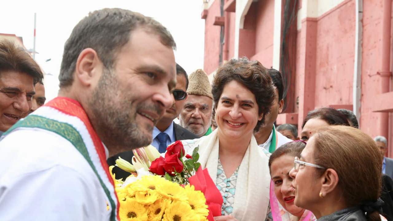 All India Congress Committee (AICC) General Secretary for Uttar Pradesh (East) Priyanka Gandhi Vadra (right) and Congress President Rahul Gandhi (left) being welcomed at the Lucknow airport in Uttar Pradesh. (Image: Twitter/@INCIndia)