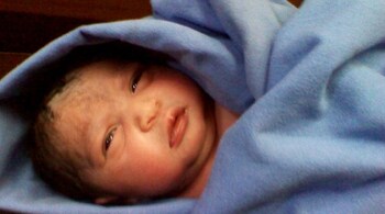 The woman, hailing from Darsheth village, gave birth to the child at a private nursing home in Palghar town on Sunday, he said.