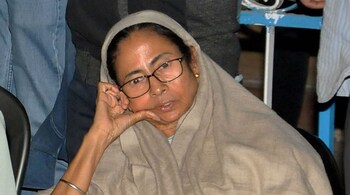 West Bengal Chief Minister Mamata Banerjee sitting on her 'Save the Constitution' dharna after CBI raids Kolkata Police Commissioner's residence in Kolkata late evening on February 03, 2019. (Image: PTI)