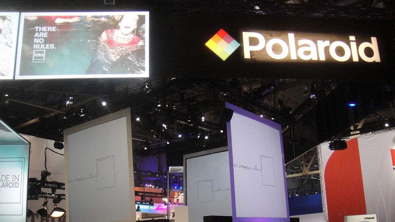 Q8. Invented by Polaroid founder, employs diffusion transfer to move the dyes from the negative to the positive via a reagent. A negative sheet was exposed inside the camera, then lined up with a positive sheet and squeezed through a set of rollers which spread a reagent between the two layers, creating a developing film &quot;sandwich&quot;. The negative developed quickly, after which some of the unexposed silver halide grains were solubilized by the reagent and transferred by diffusion from the negative to the positive. After a minute, the back of the camera was opened and the negative peeled away to reveal the print. What was it called? (Image: Wikimedia Commons)