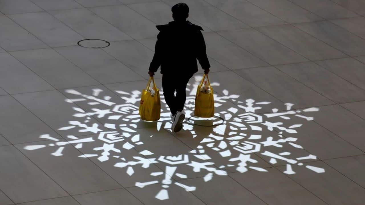 US jobless claims jump to 242,000, highest level since December