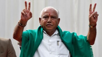 India's ruling Bharatiya Janata Party (BJP) leader B. S. Yeddyurappa flashes the victory sign after taking oath as Chief Minister of the southern state of Karnataka inside the governor's house in Bengaluru,karnataka lok sabha polls 2019,yeddyurappa dynasty watch,yeddyurappa family