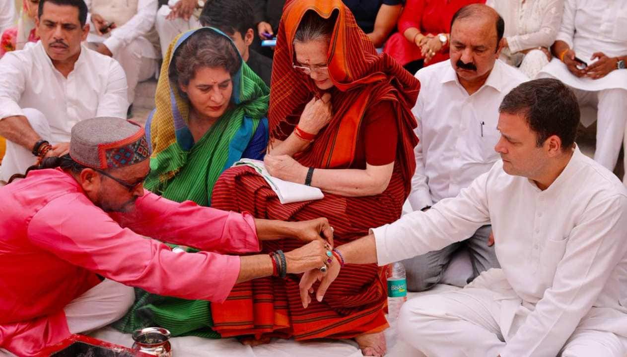 Seen here are Congress chief Rahul Gandhi, UPA Chairperson Sonia Gandhi and UP(East) Gen Secy Priyanka Gandhi offering prayers during a 'hawan' before Sonia files her nomination papers from Congress citadel Rae Bareli. Sonia has won from the seat four consecutive times. (Image: Twitter/@INCIndia)