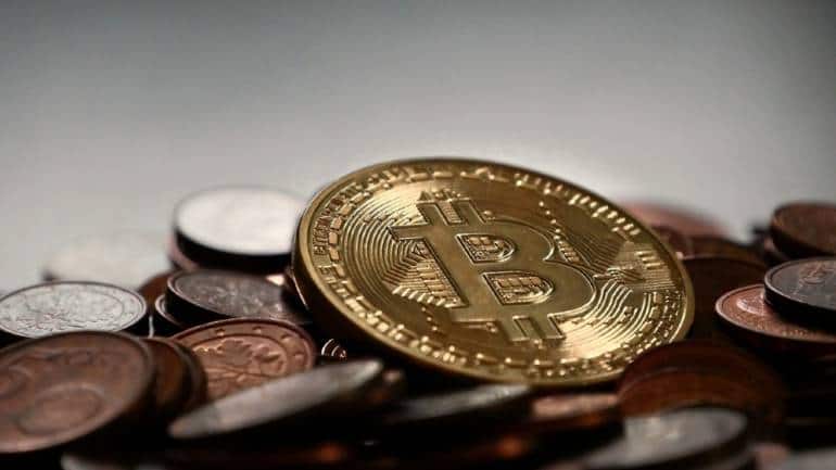 un bitcoin în rupii