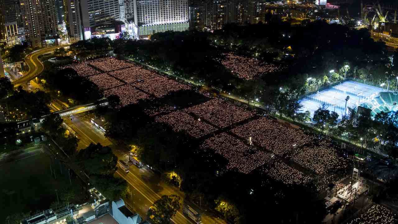 In neighbouring Hong Kong, activists are commemorating the event with an annual candlelight vigil attracting about 180,000 people. (Image: Reuters)