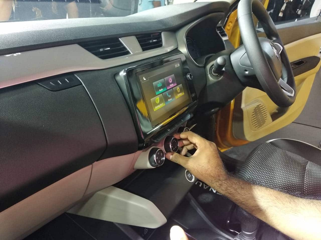There is an 8-inch multimedia touch screen system featuring MediaNav Evolution and compatible with Adroid Auto and Apple CarPlay. Rear parking sensors and reverse camera are also provided on the Triber besides four airbags. (Image: Moneycontrol)