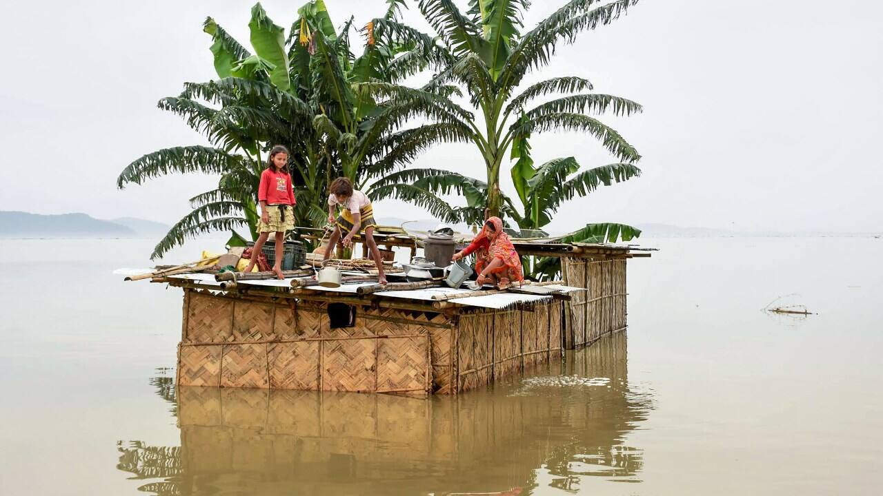 At least 15 teams of the National Disaster Response Force (NDRF), comprising 380 personnel, have been deployed in the state to tackle the situation. They have rescued 2,500 people between July 11 and July 15. However, at least 15 people have lost their lives to the floods. (Image: PTI)