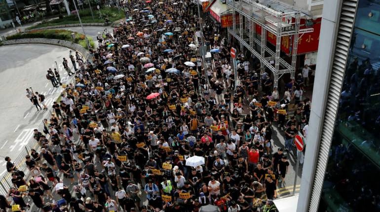 Hong Kong police fire pepper spray as protesters turn violent