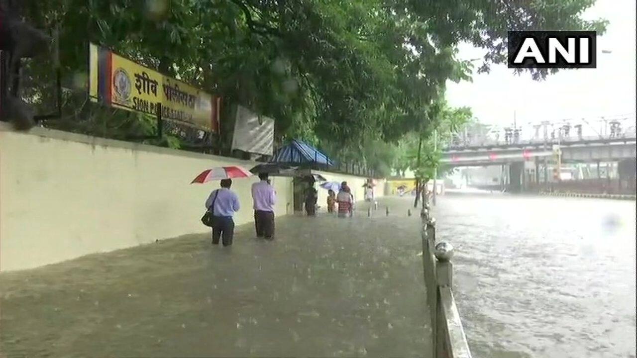 The area outside Sion Police station flooded due to Mumbai rains. (Image: ANI)