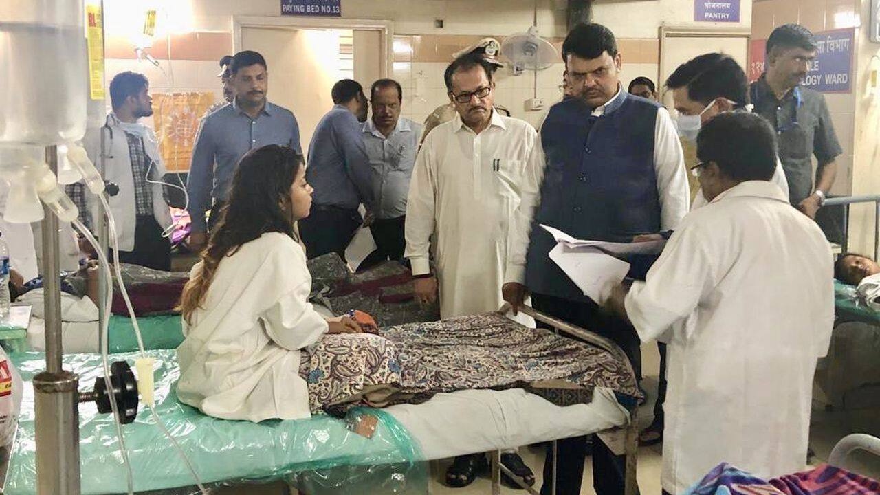 Maharashtra Chief Minister Devendra Fadnavis visited Shatabdi Hospital to meet persons injured due to Malad Wall Collapse incident in Mumbai. Minister Yogesh Sagar was also present. (Image: Twitter/@Dev_Fadnavis)