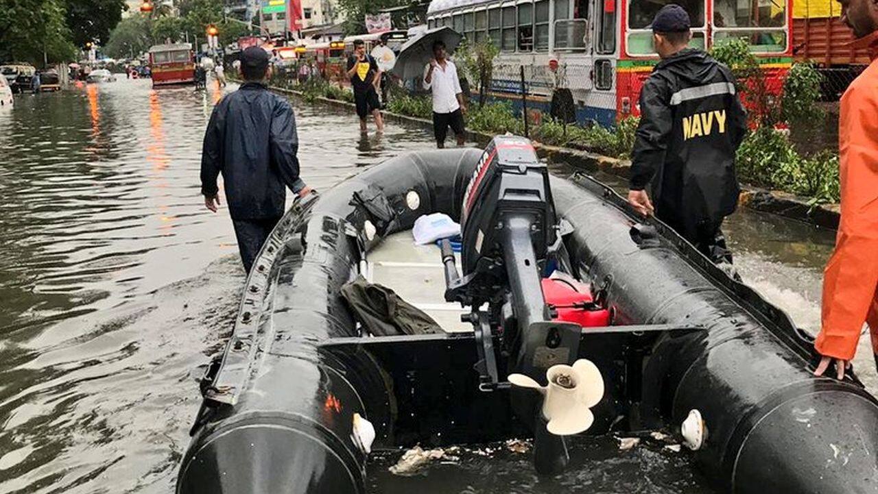Indian Navy deployed various teams to provide relief to rain hit and stranded people in Kurla area. (Image: Twitter/@indiannavy)