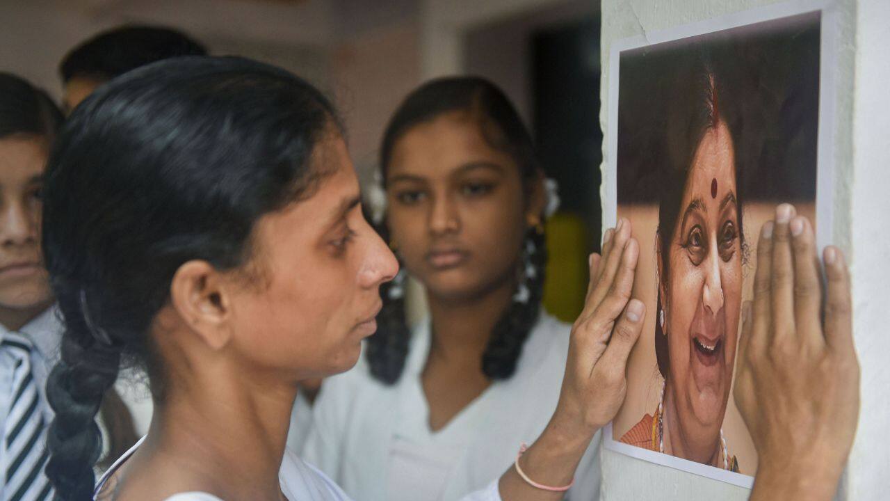 Meanwhile, Geeta, a deaf-mute Indian woman who accidentally crossed over to Pakistan, breaks down while paying tribute to former Union minister Sushma Swaraj, during a condolence meeting in Indore. Geeta, who was stranded in Pakistan for nearly 15 years, was rescued and brought back to India after an intervention by Swaraj as the external affairs minister. (Image: PTI)