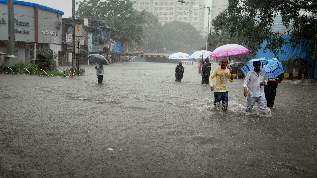 Mumbai rains: Flights abort landings, local trains delayed, schools shut amid IMD's red alert