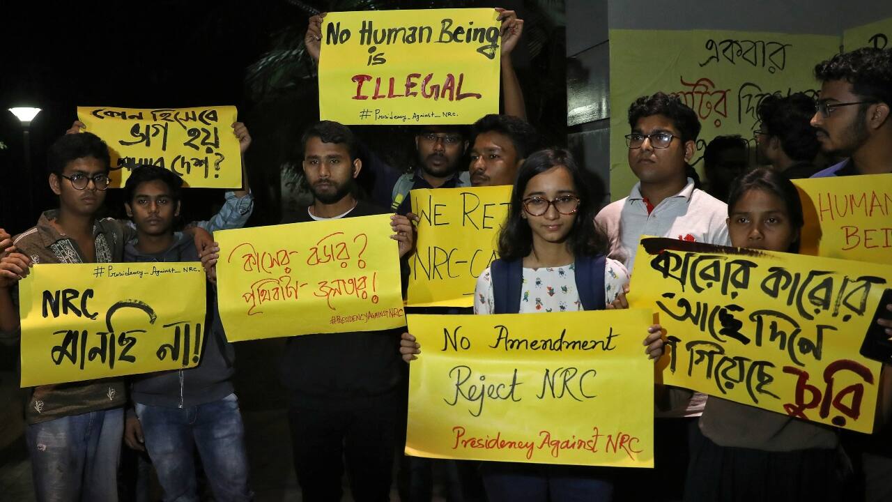However, Delhi is not the only city where citizens have been protesting against the Citizenship Amendment Act. Students display placards as they attend a protest against the National Register of Citizens (NRC) and the Citizenship Act in Kolkata. (Image: Reuters)