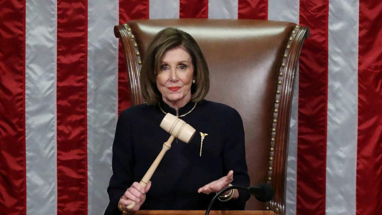 US Speaker of the House Nancy Pelosi wields the gavel as she presides over the House of Representatives approving two counts of impeachment against President Donald Trump in the House Chamber of the US Capitol in Washington on December 18, 2019. (Image: Reuters)