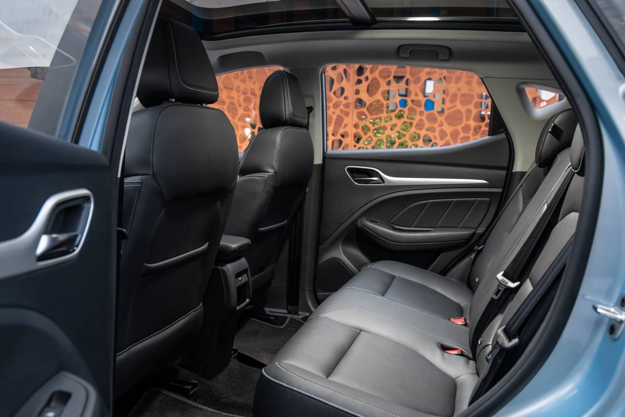 LED daytime running lights, auto headlights, silver roof rails, rear parking sensors, powered door mirrors, follow me home lights, LED centre brake light and projection headlights are featured on the ZS EV. (Image: MG Motors) 